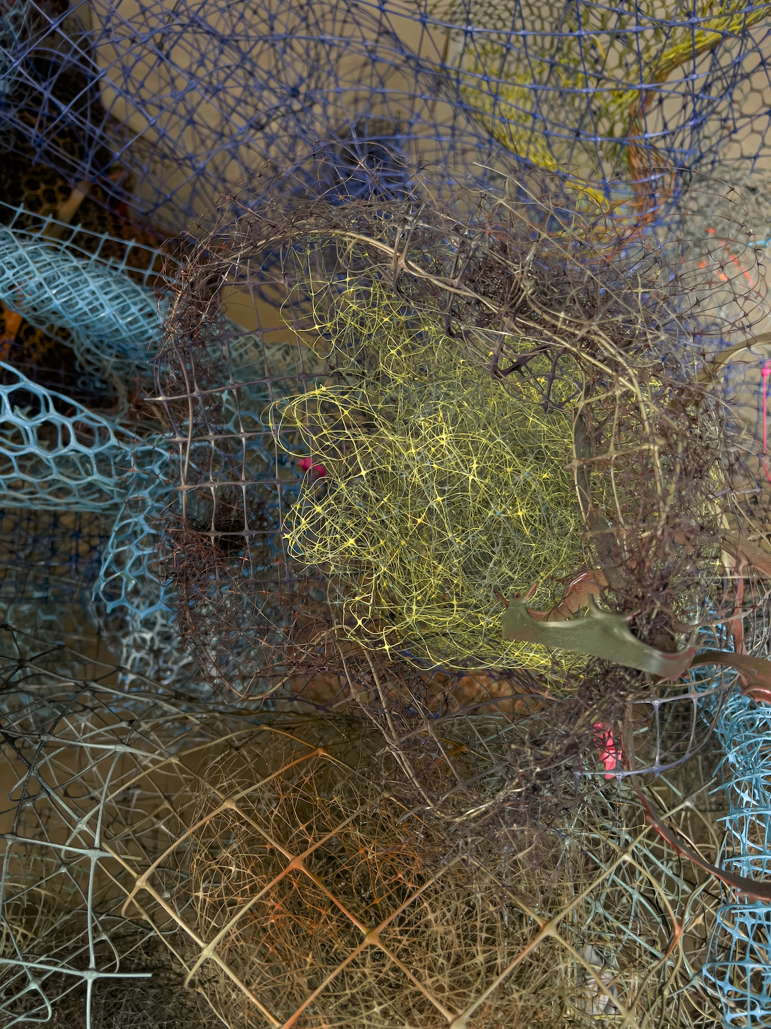 Image:Spray painted and bundled garden mesh