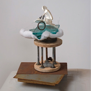 2008 plasti-dipcoated element, glass, polyfoam, wirecoil, wood, metalrods, steel fragment 171⁄2” x 11” x 11”